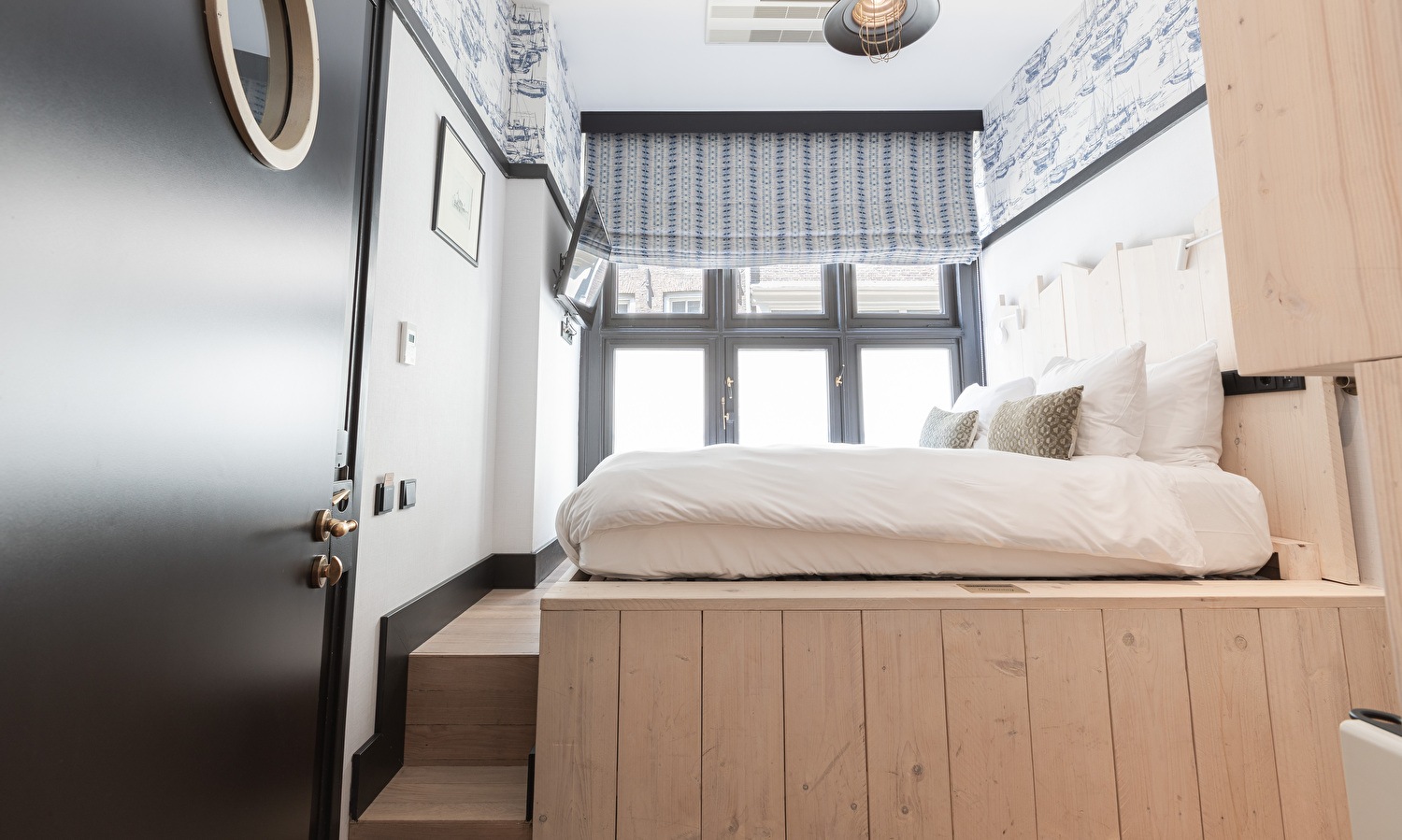 With our unique Hendrick's Hideaway, the bed is on an elevated platform